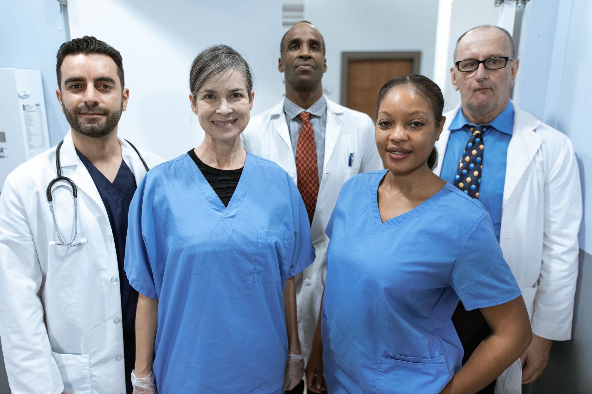 Healthcare professionals standing together indoors
